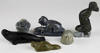 6 Inuit soapstone carvings of seals, hunters, walrus, hts 2” to 6”