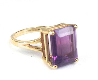 14k ladies ring with emerald cut amethyst 12mm x 9mm x 6mm. Ring size 8.