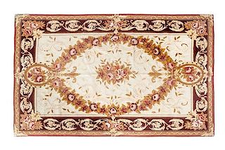 An Aubusson Style Tapestry Rug, 3 feet 10 inches x 5 feet 10 inches.