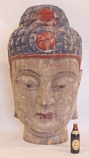 Monumental Carved and Painted Buddha Head.