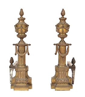 A Pair of Louis XVI Style Brass Chenets, Height 22 1/2 inches.