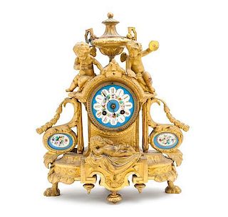 A Napoleon III Gilt Metal Figural Mantel Clock, Height 16 inches.