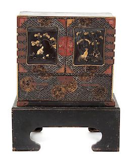 A Japanese Lacquer Decorated Chest, Height 41 x 33 x 19 1/2 inches.