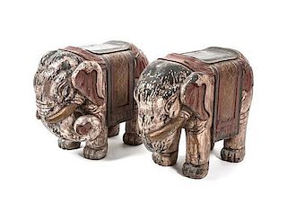A Pair of Carved and Painted British East India Wood Elephants, Height 16 1/2 inches.