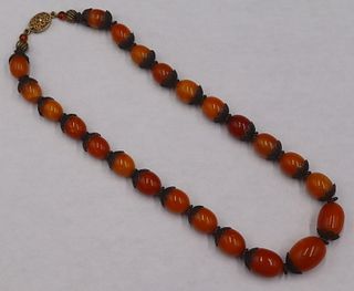JEWELRY. Graduated Amber Beaded Necklace.
