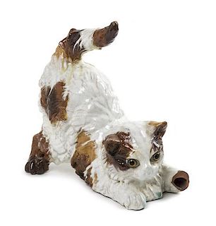 A Mottahedeh Porcelain Cat-form Vessel, Length 11 1/2 inches.