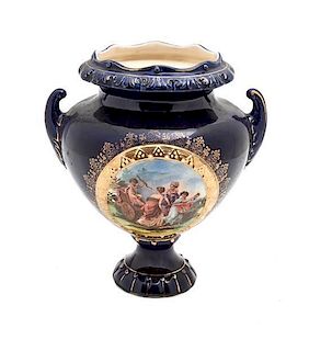 A Sevres-Style Porcelain Urn, Height 9 x width 8 inches.