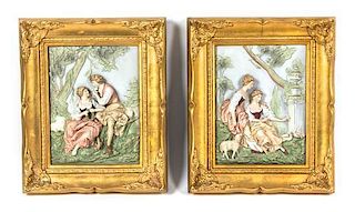 A Pair of Porcelain Relief Plaques, Height 10 1/4 x width 7 3/4 inches.