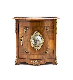 A Porcelain and Gilt Metal Mounted Diminutive Dresser, Height 11 3/4 inches.