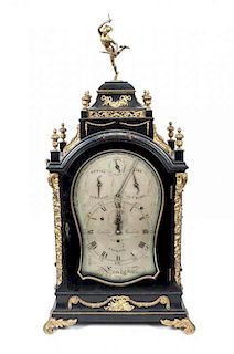 A Continental Black Lacquered Wood and Gilt Ormolu Mounted Mantel Clock, Height 37 x width 18 1/2 x depth 12 1/4 inches.