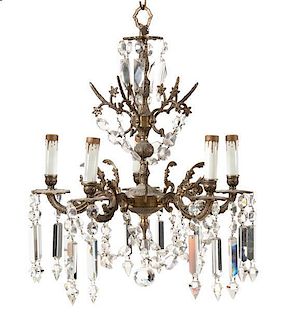 A Metal and Crystal Five-Light Chandelier, Height 29 inches.