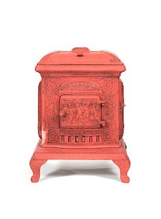 A Painted Glenwood Cast Iron Parlor Stove, Height 33 1/2 inches.