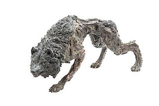 A Bronze Figure of a Wolf, Height 8 x length 16 1/2 inches.