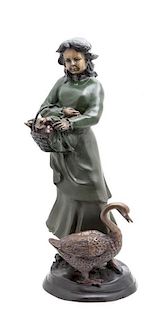 A Bronzed Figure of a Woman with a Duck and Basket, Height 24 inches.