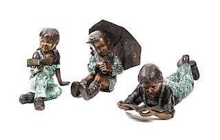A Collection of Three Bronzed Metal Figures of Girls, Height of largest 12 x length 36 inches.