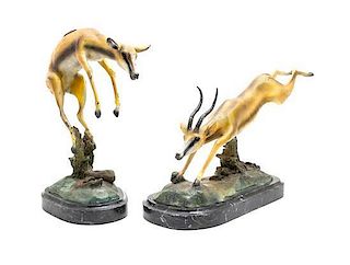 A Pair of Painted Metal Figures of Deer, Height of taller 16 1/2 inches.