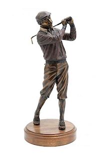A Bronzed Metal Figure of a Golfer, Height 17 5/8 inches.