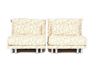 A Pair of Linge Roset Sleep Chairs, Height 32 x width 38 x depth 46 inches.