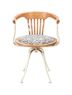 An Italian Beechwood and Steel Swivel Chair, Height 29 inches.