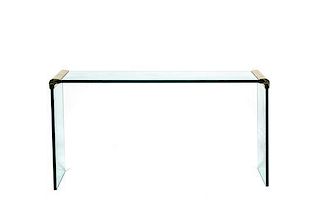 A Glass and Brass Sofa Table, Height 29 1/4 x width 57 x depth 16 inches.