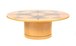 A Contemporary Parquetry Inlaid Low Circular Table, Height 16 1/2 x diameter 47 1/2 inches.