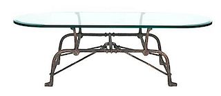 A Contemporary Black Patinated Bronze and Glass Top Low Table, Height 16 3/4 x width 55 3/4 x depth 20 inches.