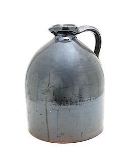 An American Stoneware Jug, Height 13 inches.