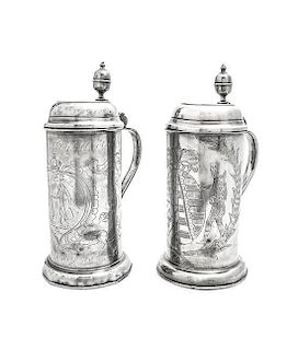A Pair of German Pewter Flagons, Height 13 inches.