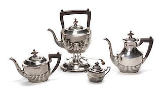 A Silver Tea and Coffee Service, Height overall of tallest 10 inches.