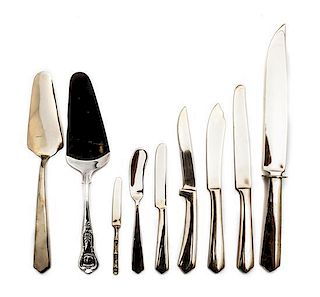 A Thai Metal Flatware Service for Twelve, Length on longest 13 1/2 inches.