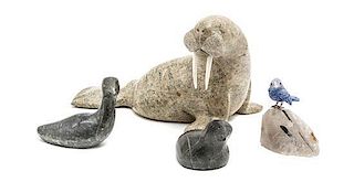 A Collection of Inuit Hardstone Carved Figures, Length of longest 8 inches.