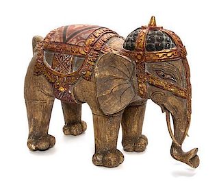 An Indian Carved Wood Figure of an Elephant, Height 15 inches.