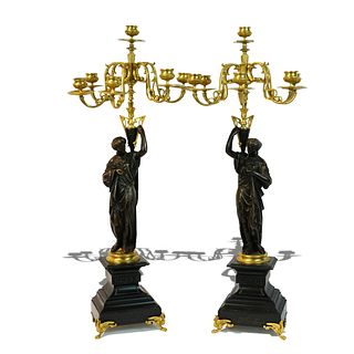 Pair of XIX century empire style bronze candelabras.