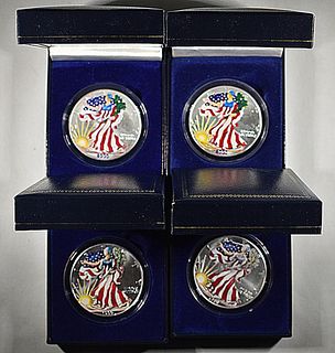 2 EACH 1999, 2000 PAINTED AM. SILVER EAGLES