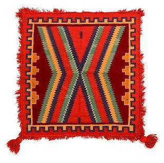 A Navajo Germantown Sunday Saddle Blanket, 28 1/2 x 26 inches.
