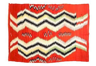 A Navajo Transitional Blanket, 65 x 90 inches.