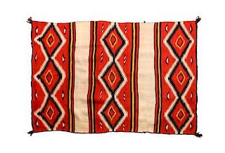 A Navajo Transitional Blanket, 44 x 70 inches.
