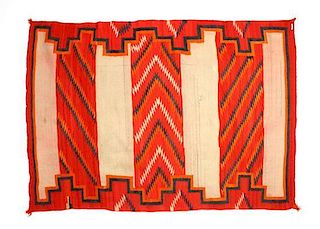 A Navajo Transitional Blanket, 55 x 72 inches.