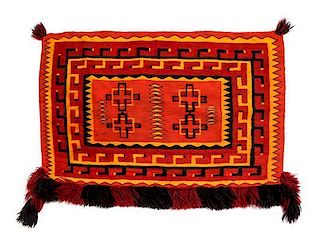 A Navajo Teec Nos Pos Sunday Saddle Blanket, First: 24 x 32 inches.