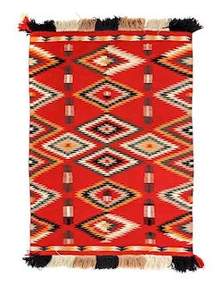 A Navajo Germantown Tapestry, 43 1/2 x 32 inches.