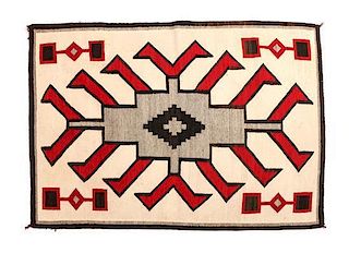 A Navajo Crystal Pictorial Rug, First: 38 x 59 inches.
