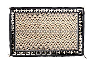 A Navajo Two Grey Hills Rug, 81 1/2 x 54 1/2 inches.