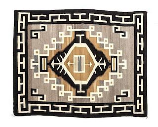 A Navajo Two Grey Hills Rug, 54 x 44 inches.