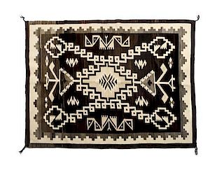 A Navajo Two Grey Hills Rug, 47 x 63 inches.
