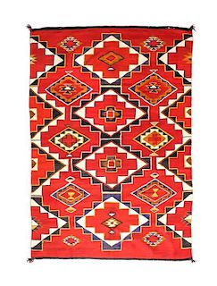 A Navajo Red Mesa Weaving, 80 x 55 1/2 inches.