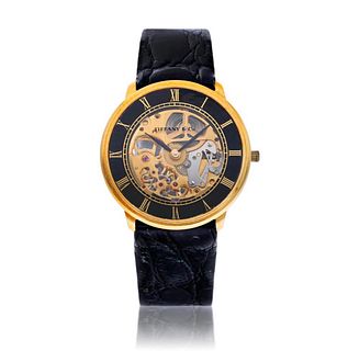 Tiffany and Co gold and enamel skeletonized wristwatch, 18k gold