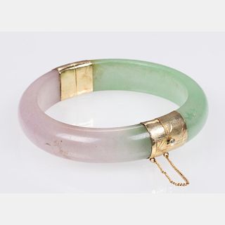 A Lavender and Celadon Jade Bracelet,
