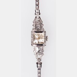 A Ladies Platinum, 14kt. White Gold and Diamond Wrist Watch by Kent,