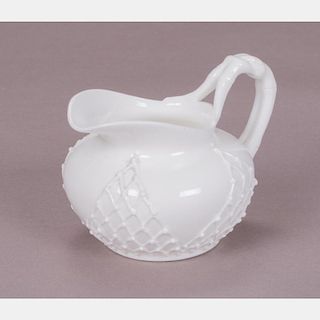 A Knowles Taylor Knowles White 'Lotus Ware' Creamer, 20th Century,