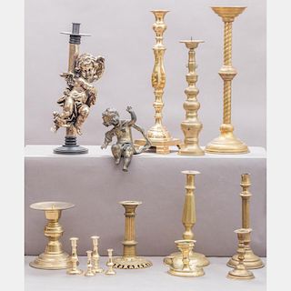 A Miscellaneous Collection of Brass Candlesticks, 19th/20th Century.